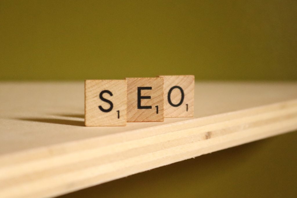 wooden blocks on wooden table spelling the word seo